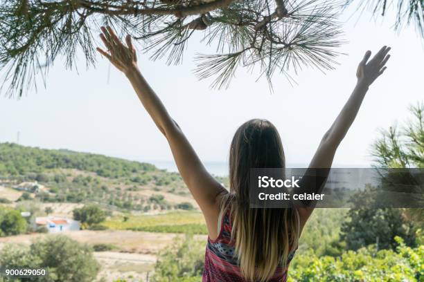 Female Sits Near By Valley At Summer Time Phone Bozcaada Canakkale Turkey 2017 Stock Photo - Download Image Now