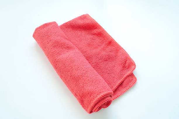 istock Close up new red wipes or rags isolated on white background. (Selective focus) 900632730