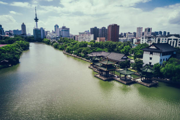 istock river through city in shanghai 900636410