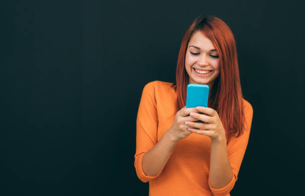 istock Woman texting on the phone 900637220