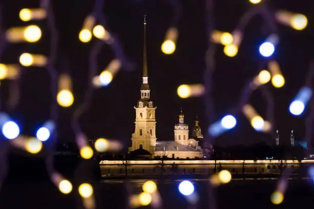 New Year's landscape with glowing lights night St. Petersburg view of the Peter-Pavel's Fortress.