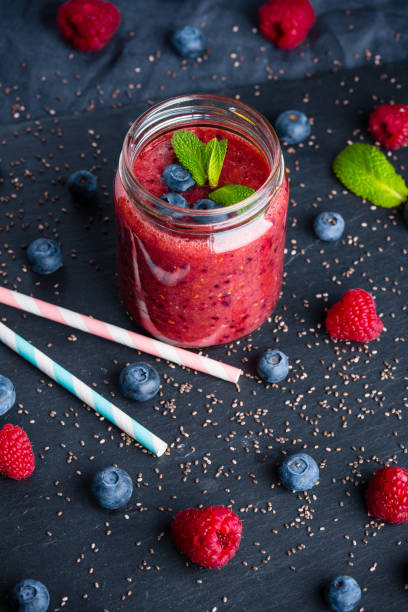 istock Fresh healthy blueberries raspberries and chia seeds smoothie 900641304
