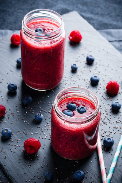 istock Fresh healthy blueberries raspberries and chia seeds smoothie 900641306