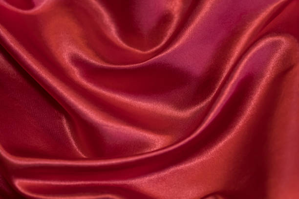 istock Fabric beautiful folds. Background of textiles. 900644730