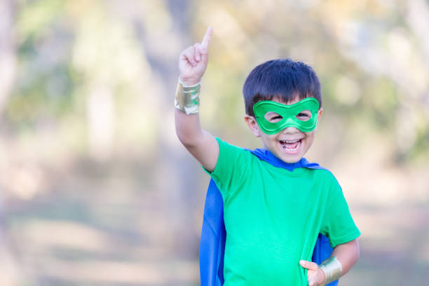 istock Young superhero saves the day 900664862