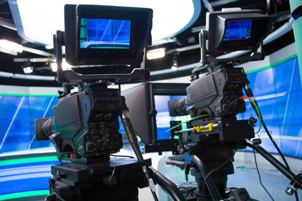 istock tv news studio with two camera and lights 900666160
