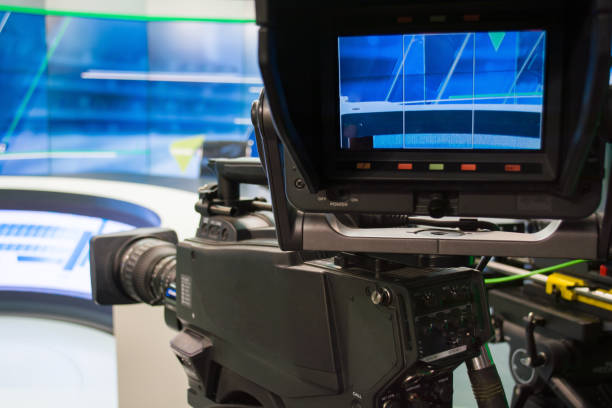 istock tv news studio with camera and lights 900666184