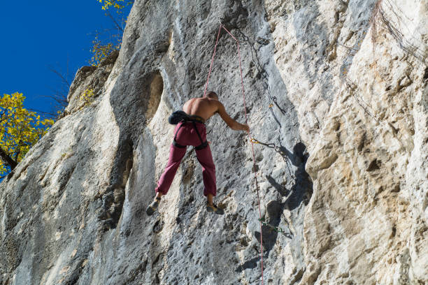 istock Extreme autumn,rock climbing 900666252