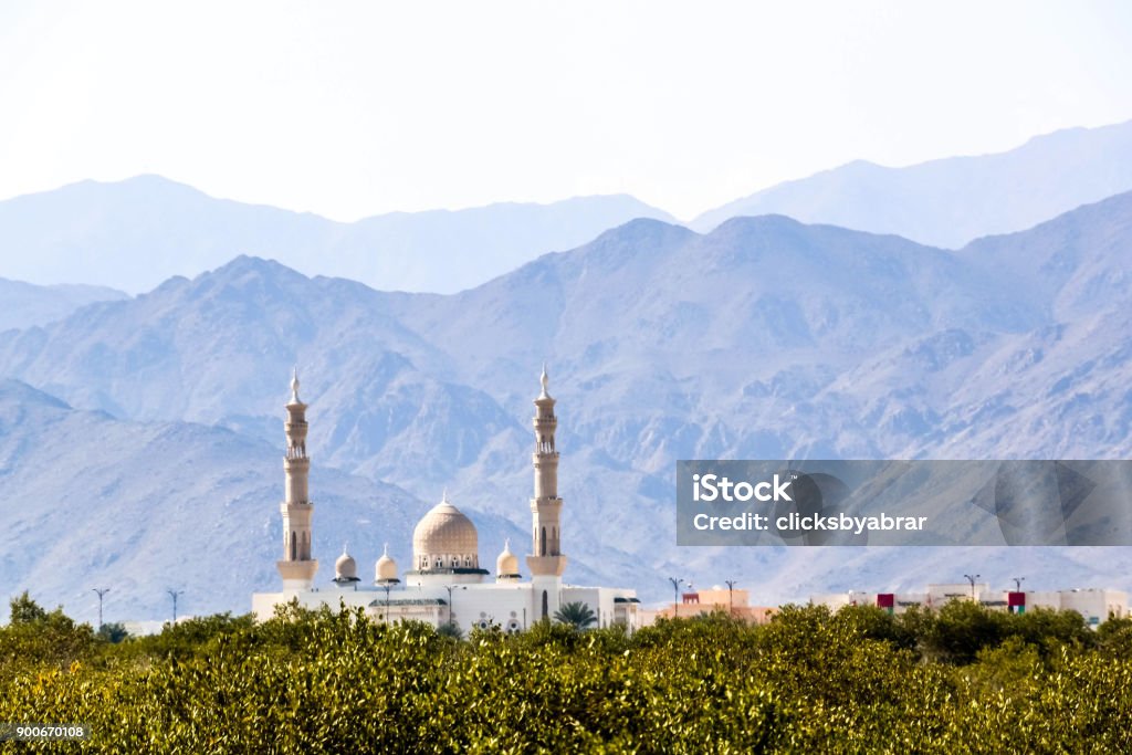 Beautiful View of Kalba Mosque, Sharjah, United Arab Emirates Architectural Dome Stock Photo