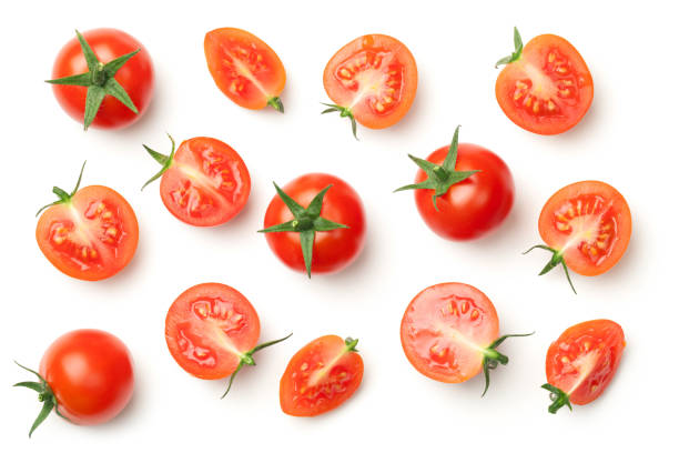 pomodori ciliegini isolati su sfondo bianco - shiny group of objects high angle view close up foto e immagini stock