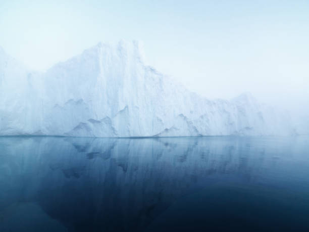 istock Massive Iceberg floating on arctic ocean in Greenland 900684154