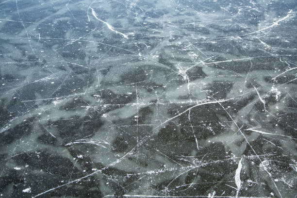 istock Skate Tracks on Frozen Lake Ice 900684970