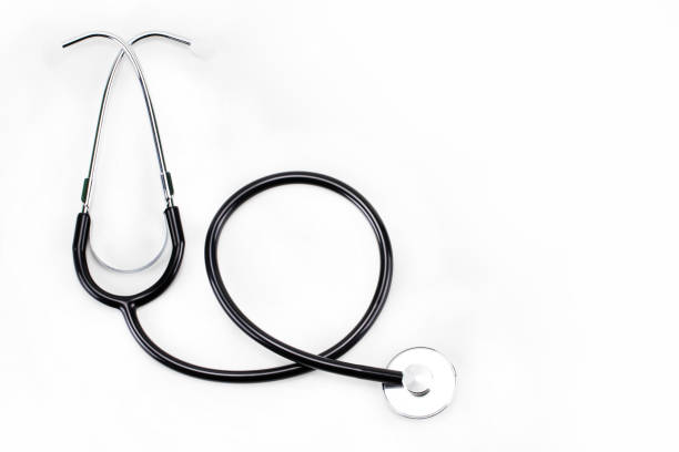 istock Close up view of black stethoscope isolated on white background 900685434