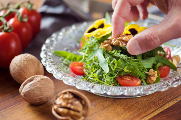 Salad with wild herbs and flowers perfect for neutralizing your gut – vegan and perfect for detox
