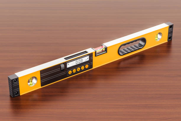 istock Digital Spirit Level on the wooden table. 3D rendering 900695990
