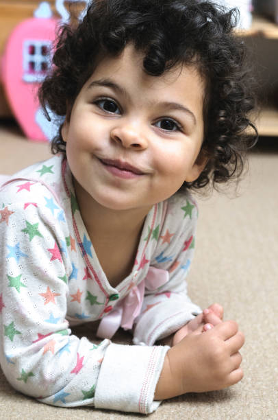 istock Smiling child (3-4) at Home. 900698754