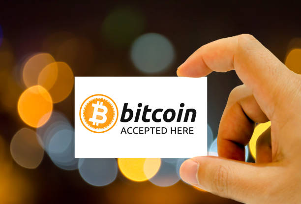 bitcoin accepted here written on business card stock photo