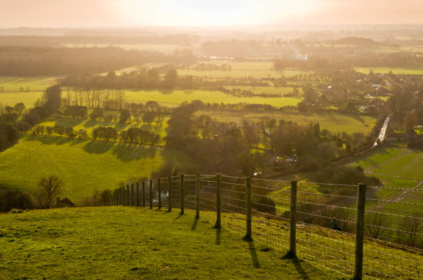 istock Fence boundary on farm in England Ashford North Downs 900706568
