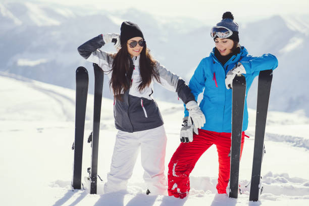 istock girls with ski 900714542