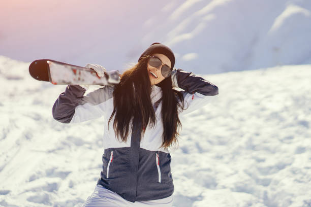 istock girl with ski 900715422