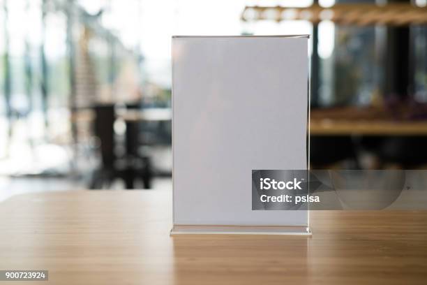 White Label In Cafe Display Stand For Acrylic Tent Card In Coffee Shop Mockup Menu Frame On Table In Bar Restaurant Stock Photo - Download Image Now