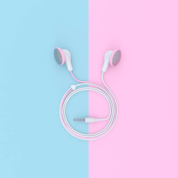 istock pink earphone on blue and pink pastel color background with clipping path 900734266