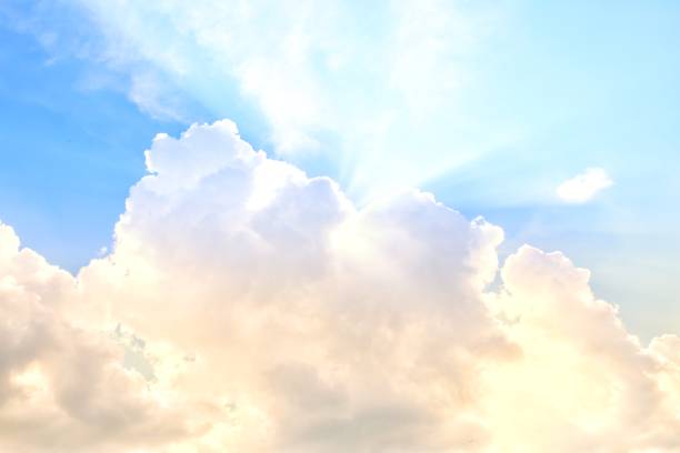 istock Heavenly Ethereal Pastel Light Beams from Cloud Sky Background 900734430