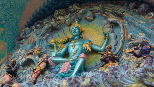 istock Hindu god statue in Thai temple. 900735426