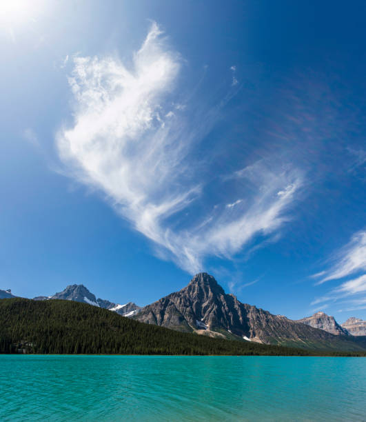 istock Dramatic clouds above the Canadian Rockies 900738996