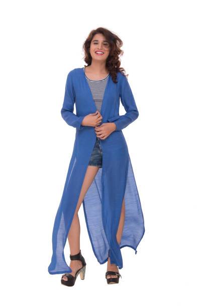istock Lady in fashionable long top with side cuts 900742280