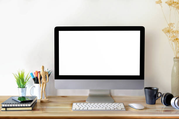 istock Desk Scene Mockup :  Workspace Desktop computer and office supplies on wood desk. 900754206