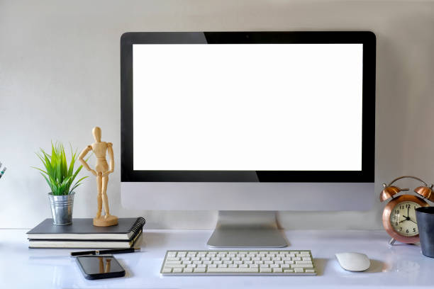 istock Desk Scene Mockup :  Workspace Desktop computer and office supplies on wood desk. 900754212