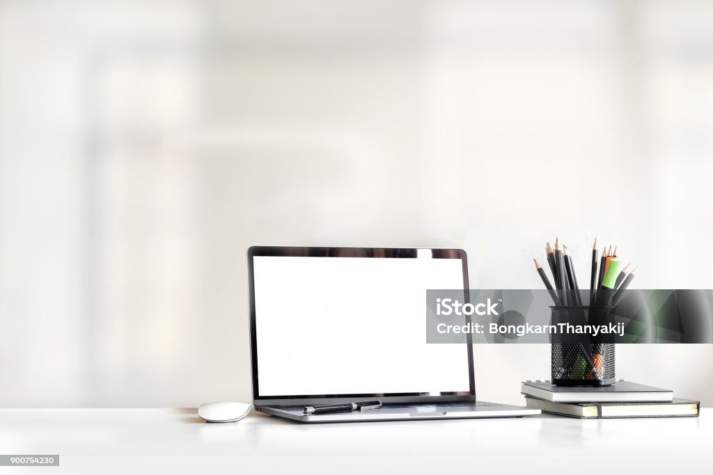 Mock up Laptop on marble table. Laptop Stock Photo