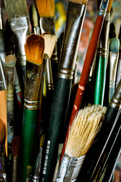 istock Artist oil paint brushes in stacks 900754928