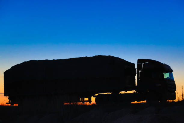 istock Transport convoy in the sunset 900755054