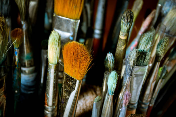 istock Artist oil paint brushes in stacks 900755100