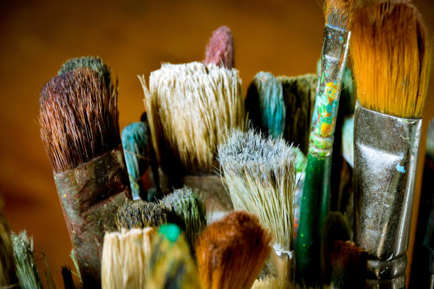 istock Artist oil paint brushes in stacks 900755120