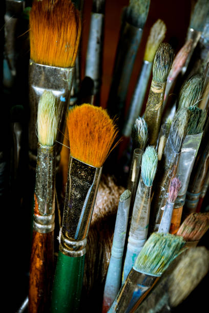 istock Artist oil paint brushes in stacks 900755162