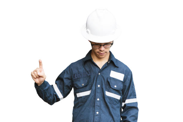 istock Asian man,Engineer or Technician in white helmet, glasses and blue working shirt suit pointing his finger, isolated on white, mechanic and Oil and Gas industrial concept with clipping path 900758712