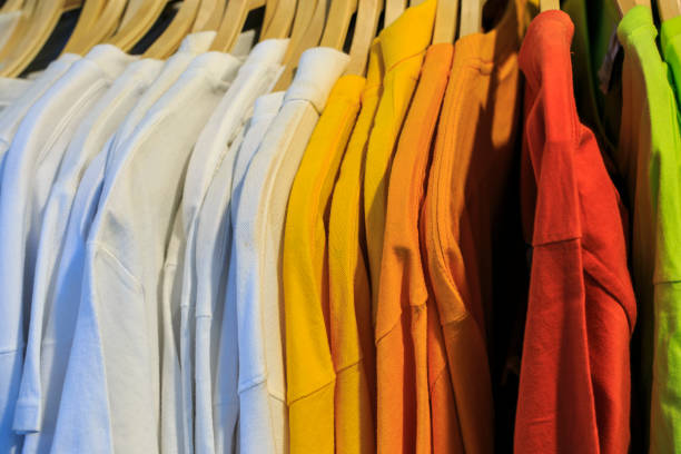 istock Color T shirts in a shop 900759084