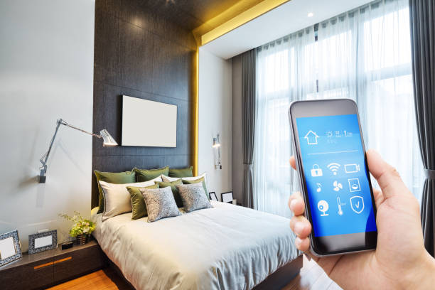 istock smart phone with smart home with modern bedroom 900767812