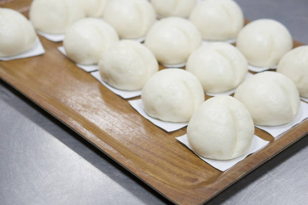 istock Close up steamed bun have aluminium table as background 900767932