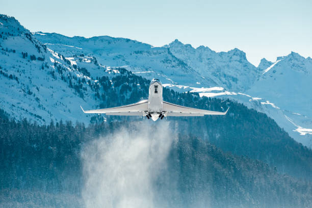 istock Business jet taking off with full power head on 900767982