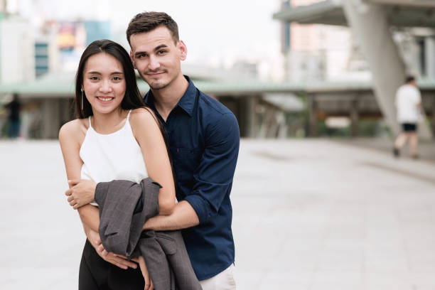 istock Happy young interracial couple. 900770188