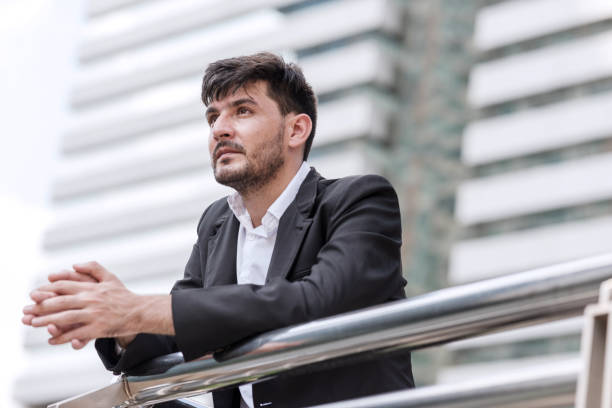 istock Sad and stress out handsome stressful white business man. 900774462