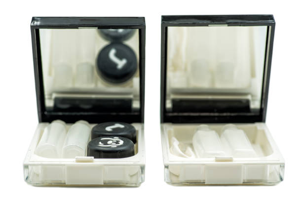 istock two contact lenses sets with a container, bottles and tweezers isolated on white 900783540