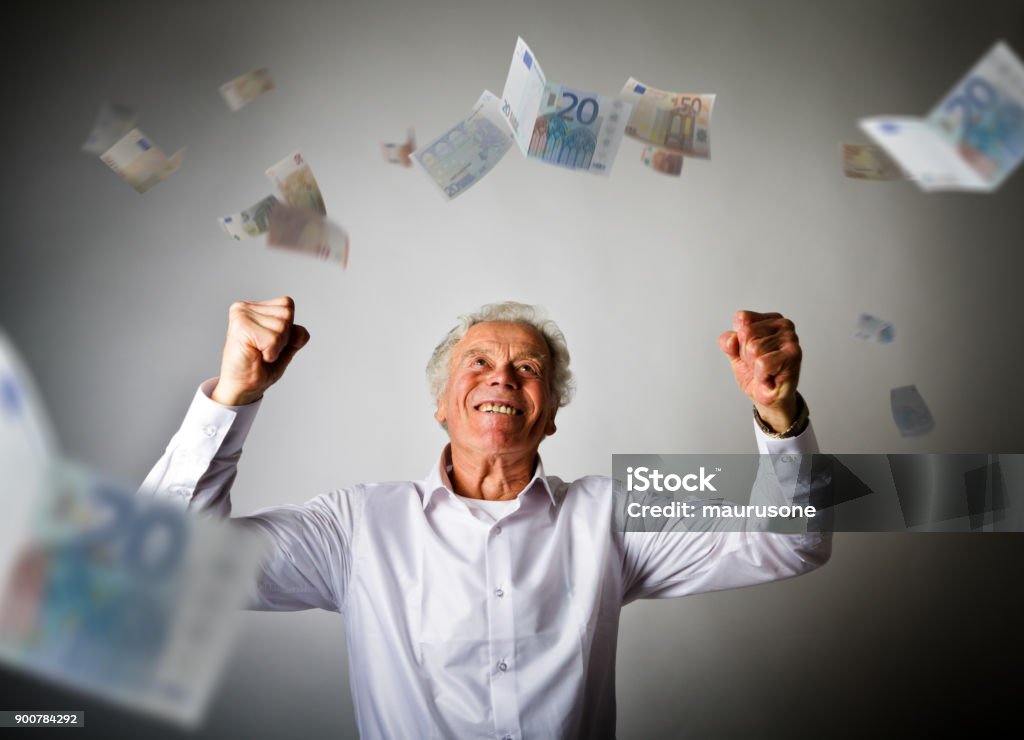 Alter Mann in weiß und sinkende Euro-Banknoten - Lizenzfrei EU-Währung Stock-Foto Alter Mann in weiß und sinkende Euro-Banknoten - Lizenzfrei EU-Währung Stock-Foto