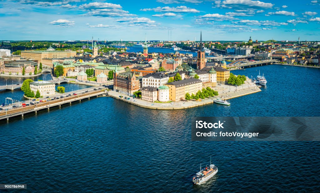 Stockholm aerial panorama over Gamla Stan city waterfront landmarks Sweden Panoramic aerial view over the blue summer skies above the iconic waterfront of Gamla Stan and Sodermalm in the heart of Stockholm, Sweden's vibrant capital city. Stockholm Stock Photo