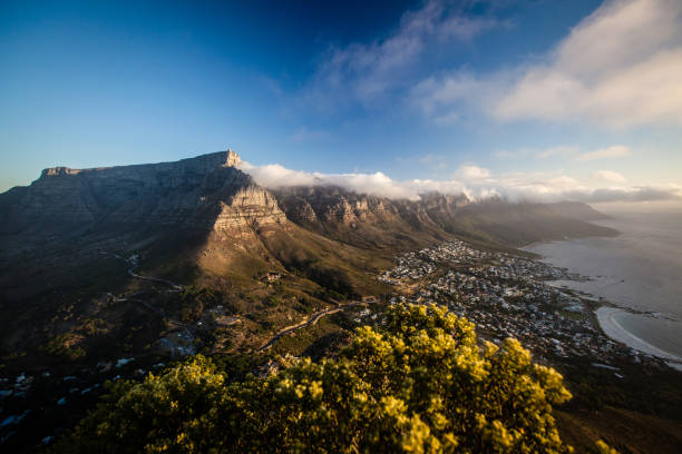 istock Table Mountain and Camps Bay Cape Town at sunset 900788994