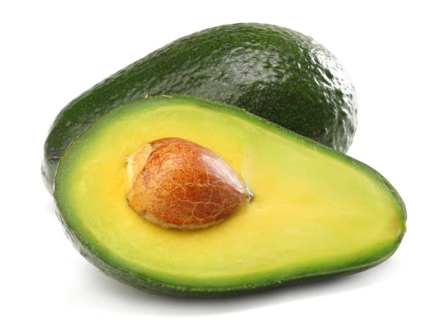 istock healthy food. sliced avocado isolated on white background 900791468
